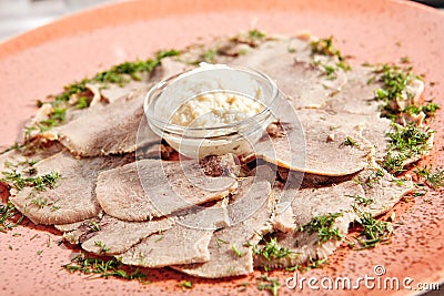 Delicatessen restaurant dish of thinly sliced boiled beef tongue Stock Photo