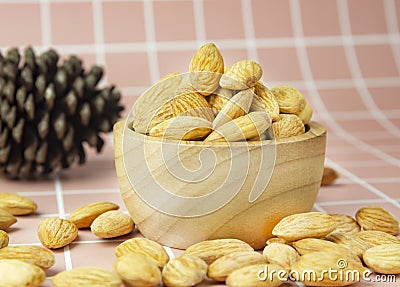 Delicious almonds in a bright, beautiful cup Stock Photo