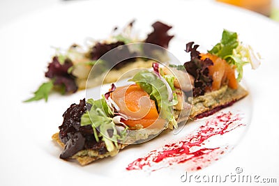 Delicious appetizer with shrimps on crispy bread Stock Photo