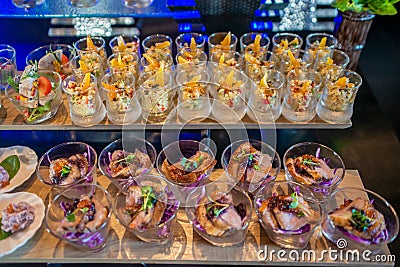 Delicious appetizers in the small glasses in the buffet Stock Photo