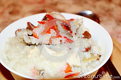 Delicious asian style crab rice with vegetables Stock Photo