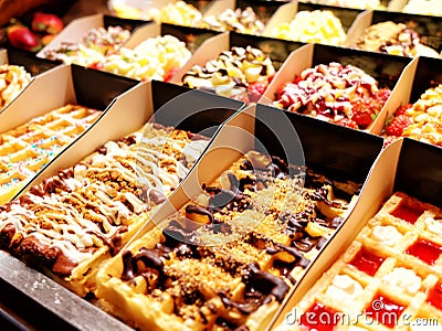 Delicious assorted Waffles on window shop in Bruxelles Belgium Stock Photo