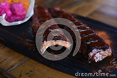 Delicious BBQ ribs, cole slaw and a tangy BBQ sauce Stock Photo