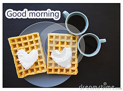 Delicious Belgian waffles with cream on a black background-good morning inscription Stock Photo