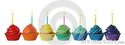 Delicious birthday cupcakes with candles isolated Stock Photo