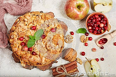 Delicious biscuit pie with apples, walnuts and cranberries Stock Photo