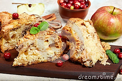 Delicious biscuit pie with apples, walnuts and cranberries Stock Photo