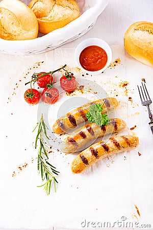 Delicious bratwurst with rolls and beer Stock Photo