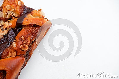 Delicious cake with peanut butter cream layer and chocolate topping. Bakery white background. Selective focus Stock Photo