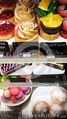 Delicious cakes behind the window in the cafe Stock Photo