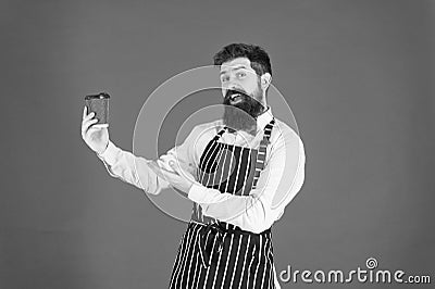 Delicious cappuccino. Serving for your pleasure. Barista handsome worker. Mature barista. Restaurant staff. Hipster Stock Photo