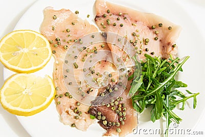 A delicious carpaccio of fresh swordfish. Stock Photo