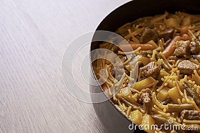Delicious casserole noodles with pieces of beef and vegetables Stock Photo