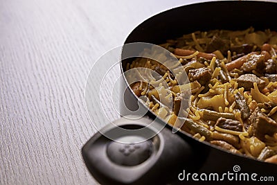 Delicious casserole noodles with pieces of beef and vegetables Stock Photo