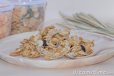 Delicious cereal caramel cornflakes warm tone background. Stock Photo