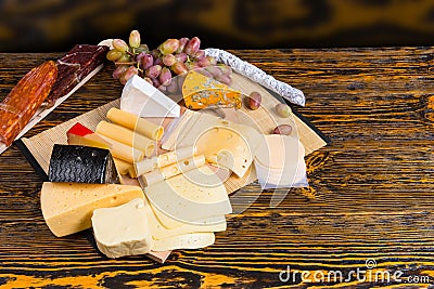 Delicious cheeseboard on a buffet table Stock Photo