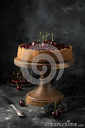 Delicious cherry cheesecake on cake stand Stock Photo