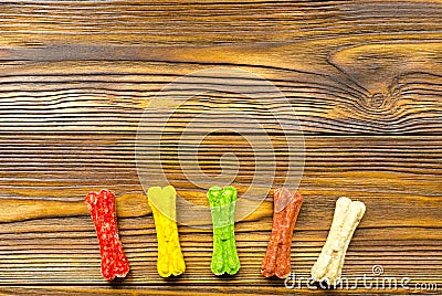 Delicious chewing colored bones and zoological biscuits for dog Stock Photo