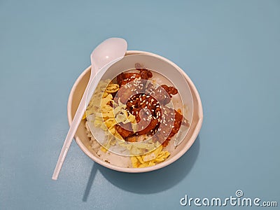 Delicious chicken side dish rice bowl Stock Photo