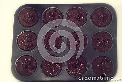 Delicious chocolate muffin cookies in a baking tin Stock Photo