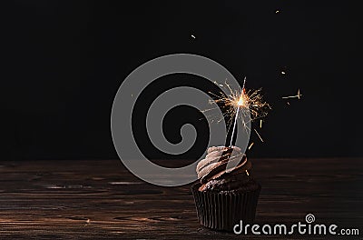Tasty home made baked birthday muffins sweets. Yummy bakery products bad for figure. Unhealthy sweets. Holiday christmas, womens m Stock Photo