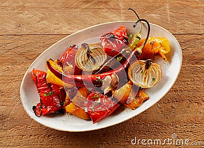 Delicious colorful hot spicy roast vegetables Stock Photo