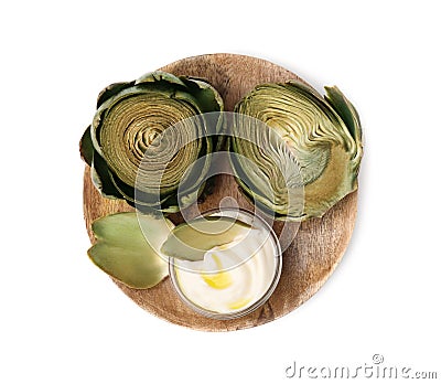 Delicious cooked artichokes with tasty sauce isolated on white, top view Stock Photo