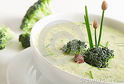 Delicious creamy vegetable soup in a white bowl. Stock Photo