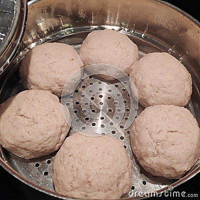 Delicious cutlets are cooked in a double boiler for a healthy diet from pike meat with salmon Stock Photo