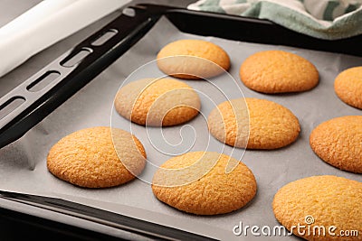 Delicious Danish butter cookies on baking tray, closeup Stock Photo