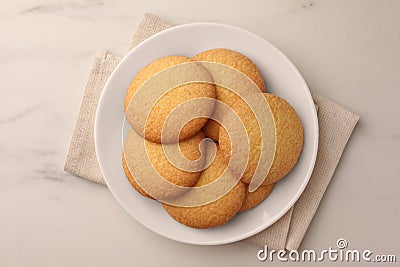 Delicious Danish butter cookies on white marble table, top view Stock Photo
