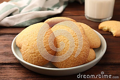 Delicious Danish butter cookies on wooden table, closeup Stock Photo