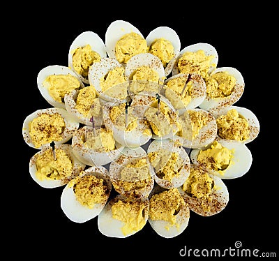 Delicious devilled eggs on a black background Stock Photo