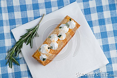 Delicious eclair closeup cream decorated Stock Photo