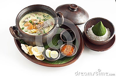 Delicious food call soto betawi soup with rice spicy chilly Stock Photo