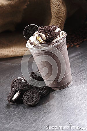 Delicious frappuccino with whipped cream and cookies Stock Photo