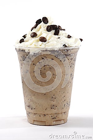 Delicious frappuccino with whipped cream in the plastic cup on the white background Stock Photo