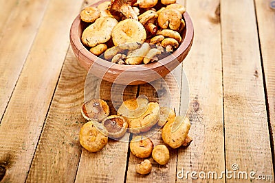 Delicious fresh lactarius mushrooms straight from the forest in a brown bowl Stock Photo