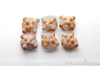 Delicious, fresh, sugary and freshly made Mexican dead bread that is made for the Day of the Faithful Dead and All Saints that is Stock Photo