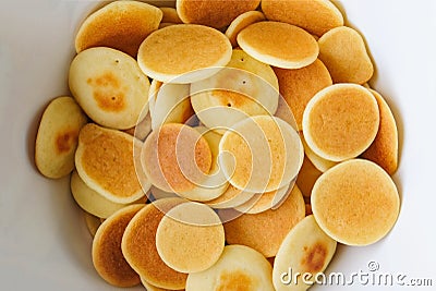 Delicious freshly cooked pancake cereal in a bowl, top view. Stock Photo