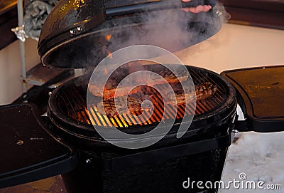 Delicious fried beef steak on an open fire Stock Photo