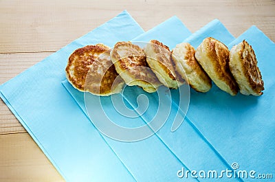 Delicious fried pancakes on a wooden table Stock Photo