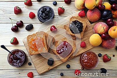 Delicious fruits jam and toasts, tasty breakfast Stock Photo