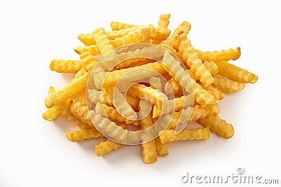 Delicious golden crispy crinkly potato chips Stock Photo
