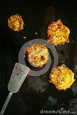 Delicious golden fried potato fritters Stock Photo
