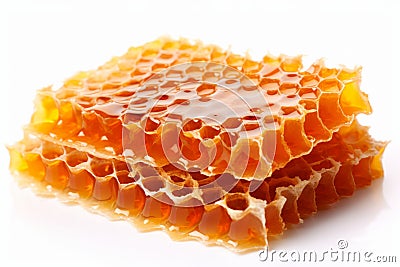 Delicious golden honey and beautifully patterned honeycomb isolated on a pure white background Stock Photo
