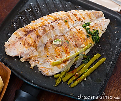 Delicious grilled bass with asparagus Stock Photo