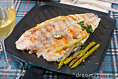 Delicious grilled bass with asparagus Stock Photo