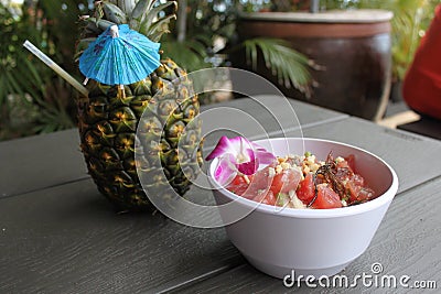 Refreshing Pineapple Shake and Tasty Poke Bowl Stock Photo