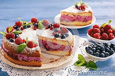 Delicious homemade cake with berry cheese cream. Stock Photo